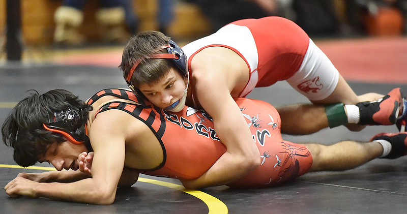 "Foran's Gino Esposito pinned Branford's Bijaya Jaisi in the 103 lb. weight class in 4:51 at the 2015 SCC wrestling championship meet, Saturday, February 14, 2015, at Amity Regional High School in Woodbridge. Foran placed second with 120 points and Branford placed fifth with 85 points. (Catherine Avalone/New Haven Register)

"