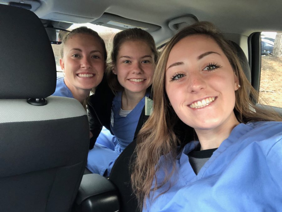 CNA+students+Abby+Licata%2C+Emma+Cote%2C+and+Sophie+Lucas+having+fun+in+the+car+on+the+way+to+clinical%2C+where+they+learn+about+nursing.+%0A