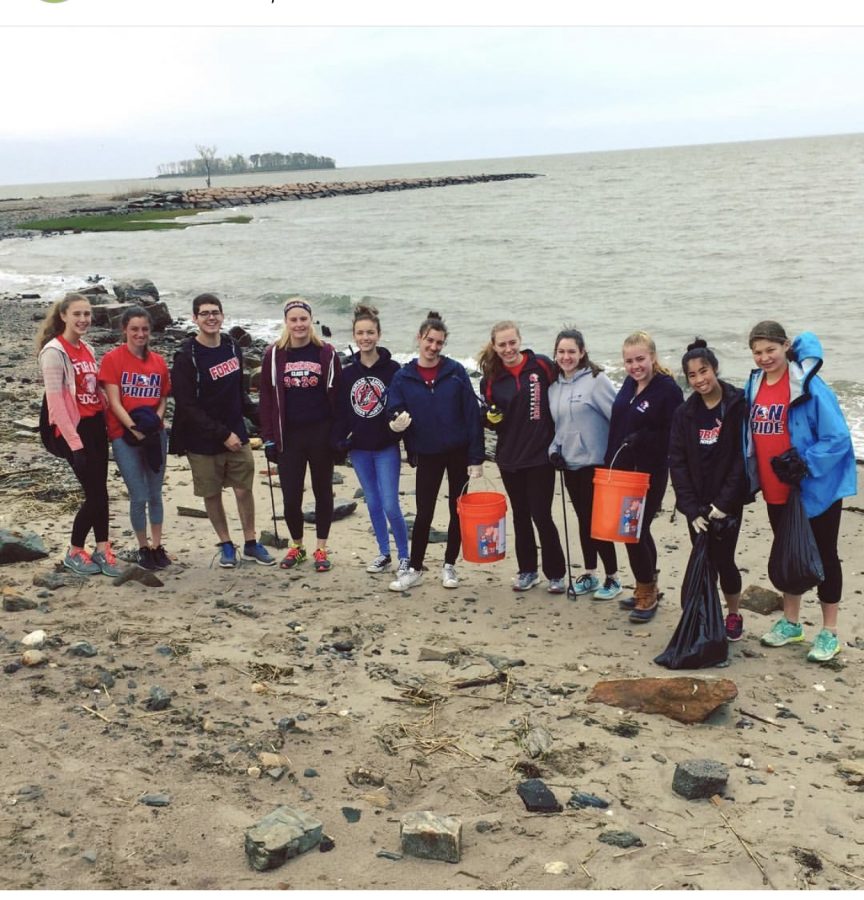 Foran’s Environmental club participating in a beach clean up. Photo courtesy of fhsenviclub on Instagram.