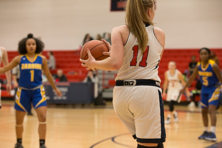 Mia Tunucci looks for an open teammate to pass to during last years season against Harding High School on January 7, 2019.