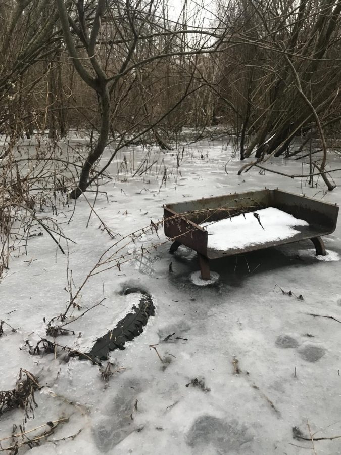  A frozen desk, ice, and tire. Photo courtesy of Shawn Gaul. 
