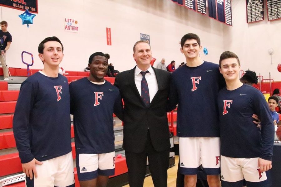 Foran+Basketball+Seniors+pose+with+head+coach%2C+Ian+Kirkpatrick.+Photo+courtesy+of+Corina+Massey.+