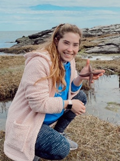 Jenna Chichowski holding a starfish at Anchor beach in Woodmont. Photo courtesy of Jenna Chichowski.
