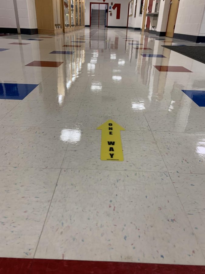 Foran High Schools one way arrow stickers in the hallway. 
Photo Courtesy:  Morgan Viesselman September 22, 2020
