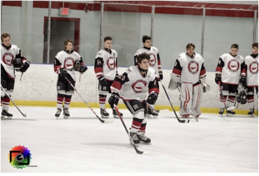  Milford hockey player Luca Ubaldi gets called out pre-game. Photo courtesy of Chris Eadevito Photography 