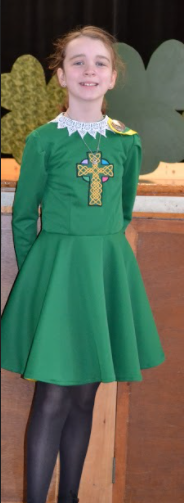 Photo Caption: Kayleigh Hackett displays her dress in her performance of Irish Step dance in 2013. 
