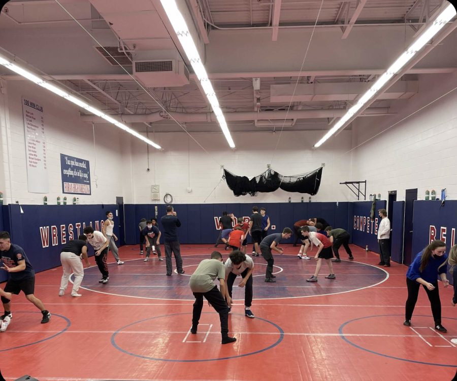Get Ready to Rumble: The Foran wrestling team takes to the mats during their practice. 