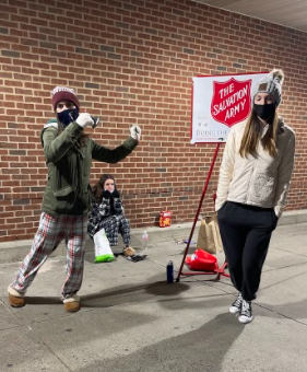 Bell Ringing: Key Club members Arezoo Ghazagh, Ava Steigbigel, and Bridget Kiernan participating in bell ringing for the Salvation Army. Photo Courtesy: Tuana Gonul, December 4, 2021.