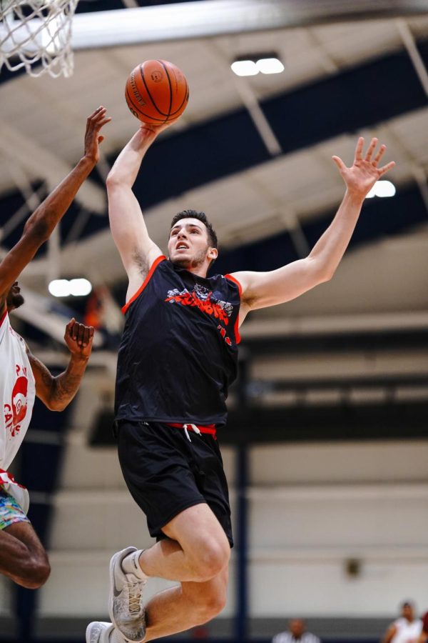 One Handed: Zach Tavitian is seen dunking the ball with one hand. Photo Courtesy: John Tavitian, July 2, 2019.