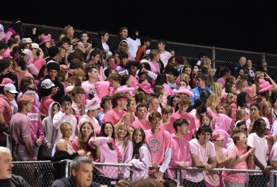 Pink+Out%3A+Student+section+cheers+on+the+football+team+while+raising+awareness+for+The+Get+in+Touch+Foundation%2C+October+7%2C+2022.