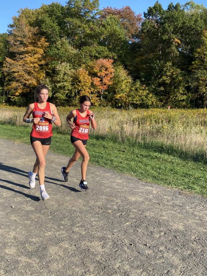 Fighting for First: Clara Pasacreta and Gianna Cappozi competing for first place October 11 2022.