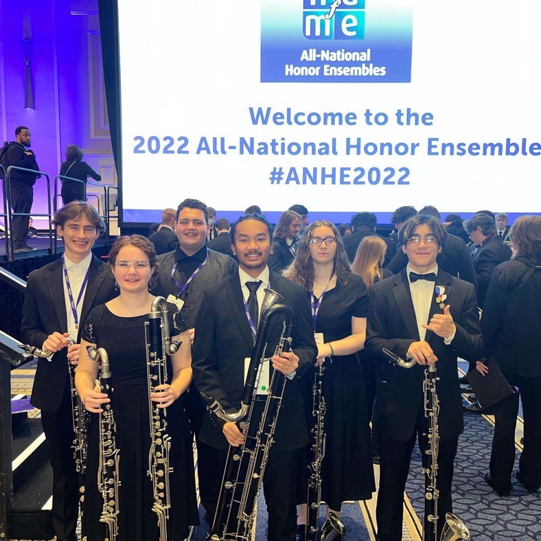 The Best Musicians in the Country: Band students pose with their instrument before playing in the All National Ensemble, November 7, 2022. 