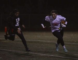 Colleen Ardolino runs with the ball to score a touchdown, November 2021. 