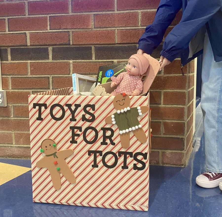 Hope for the Holidays: Student actively donating to Toys for Tots, December 6, 2022.