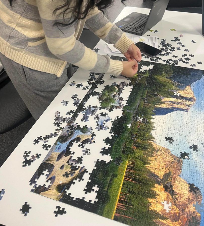 Putting the Pieces Together: Xiomari Garcia-Cruz works on a puzzle during her free time in study hall, December 7, 2022. 