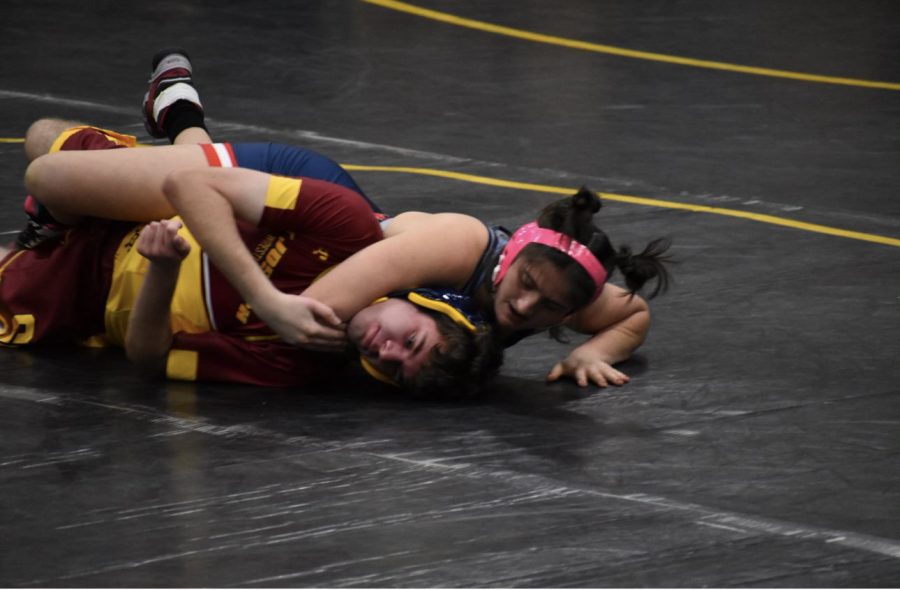 Pinned: Kelly Aspras gains advantage over a wrestler from Saint Joe’s during a recent match. January 19, 2023.
