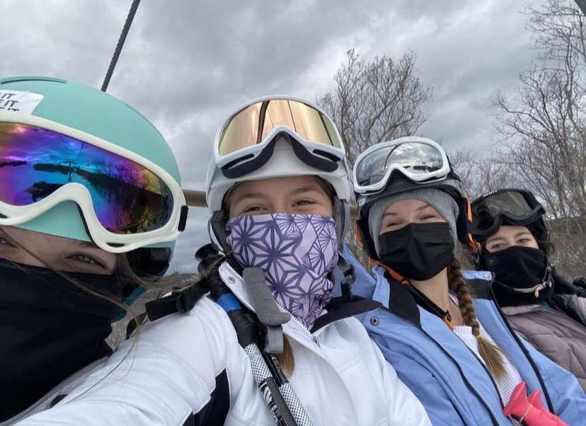 Students Skiing: Students Alana Finlayson, Olivia Salai, Erin Schmitt, and Cameron Lefebvre on ski lift during last years trip, February 12, 2022.