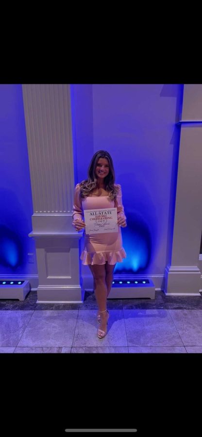 All State Cheerleader: Jonna Lord poses at her All-State banquet.
