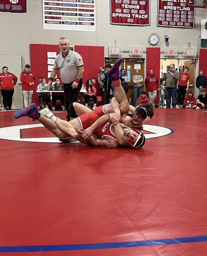 CT Lifting’s Wrestling Experience: Craig Mager tries to get his opponent in a pin during a match against Berlin, December 22, 2022.