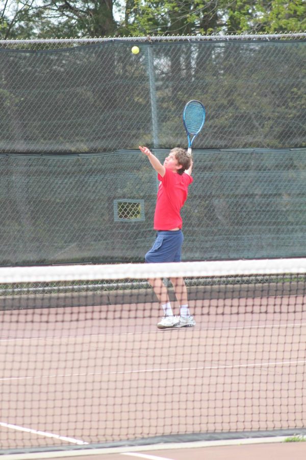 Serving it up: Ryan Purviance serving the ball to his Sheehan opponent. April 22, 2023.