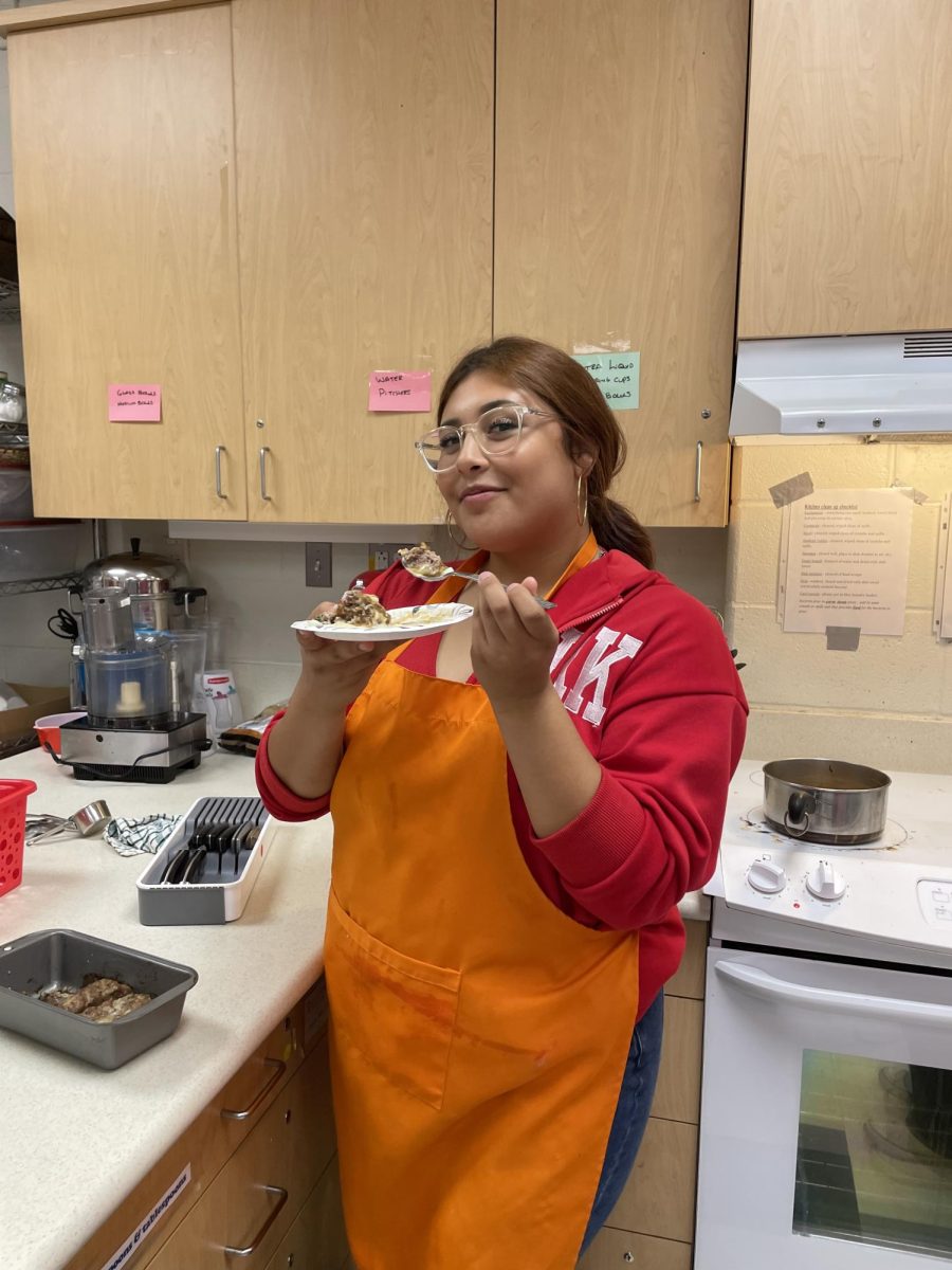 A chef’s creation: Junior S. Perez posing with her meatloaf dish, October 4, 2023.