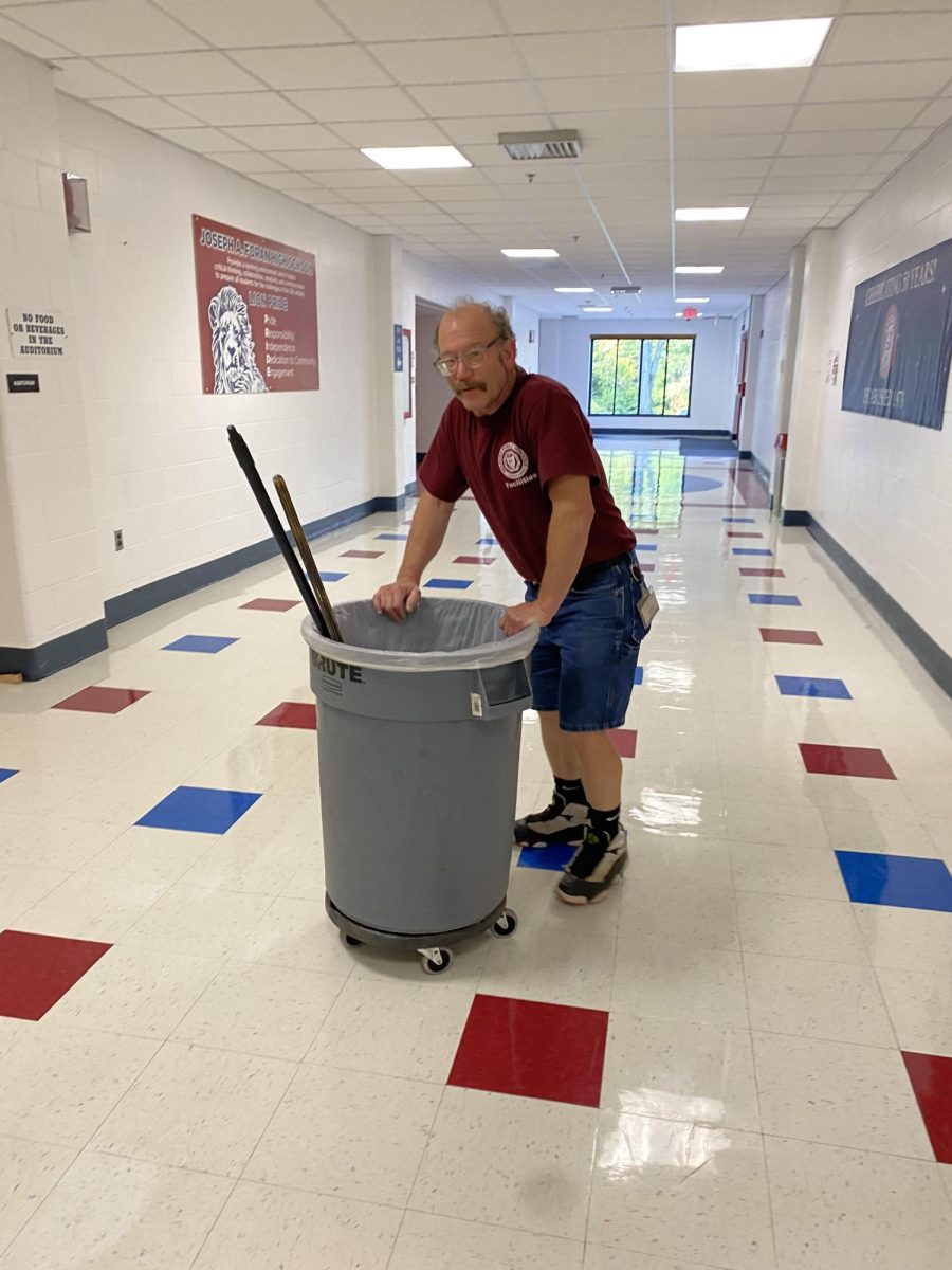 Hard at Work: Fenton working near the auditorium before students arrive for school, October 17, 2023.