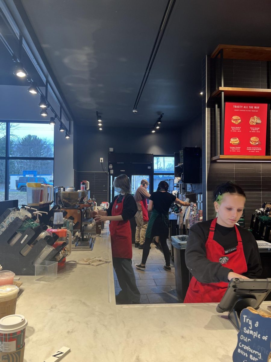 Holiday Rush: Starbucks employees working to make everyones orders during the holiday season, December 7, 2023.