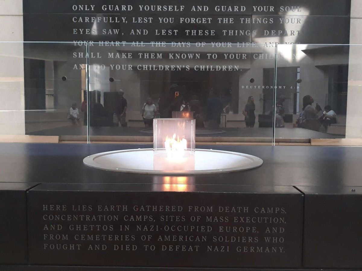 Lit candle: In memory of the 6 million Jews who were killed in the Holocaust. 