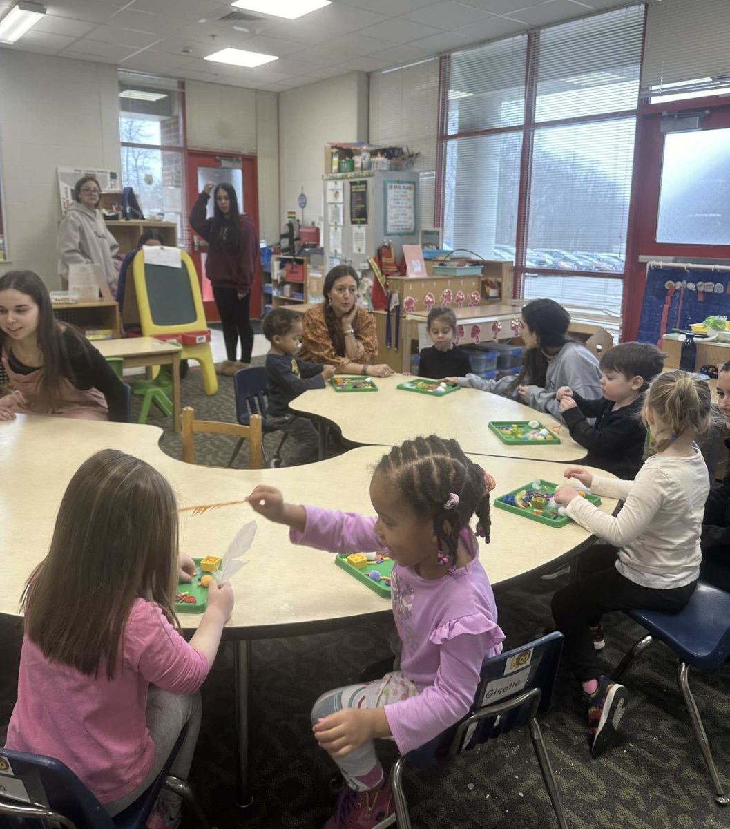  Balancing Both Worlds: Ms. Pangu working with both high school students and preschool students in the Child Learning Center. February 27, 2024.