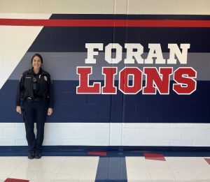 Officer Kreitman: Officer Kreitman posing in front of the wall October 10, 2024. Photo courtesy: Eva Fernandes.