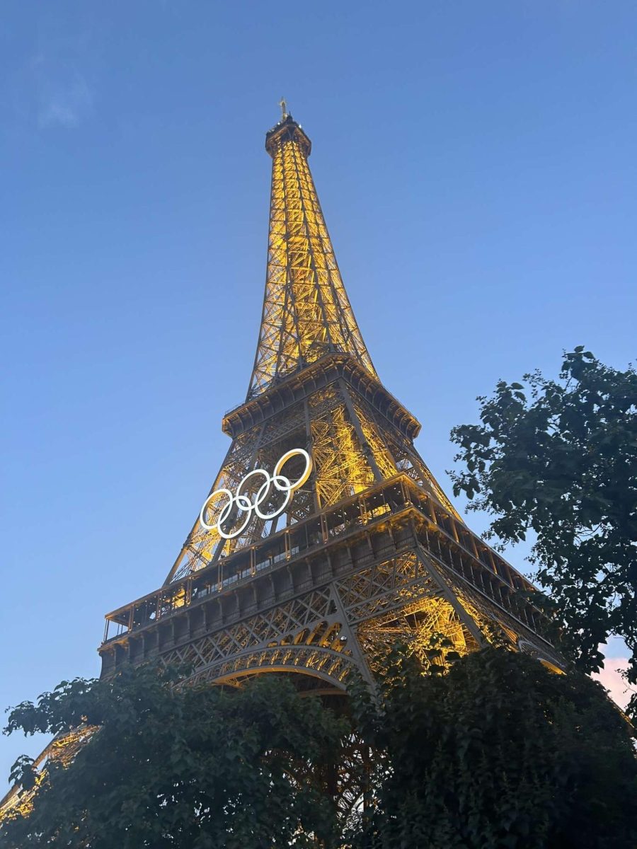 Olympic Rings: The Olympic rings being shown on the Eiffel Tower, an iconic piece of French architecture. September 17, 2024. Photo courtesy: Shea Pangu