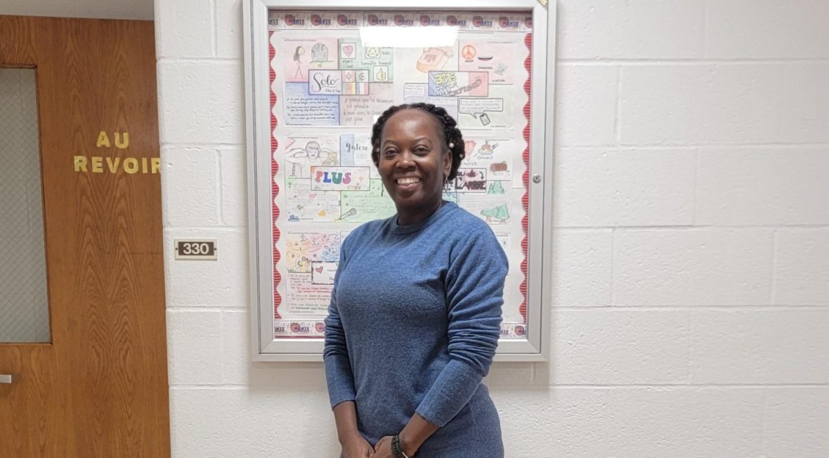 Mrs. Duncan: Mrs. Duncan posing for the camera in front of her class, October 11, 2024. Photo courtesy: Rodney Thomas