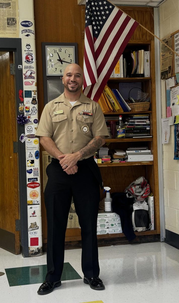 Standing strong and brave: Petty Officer David Hill-DeStefano standing next to the American Flag. November 8, 2024. Photo courtesy: Jack Kepshire
