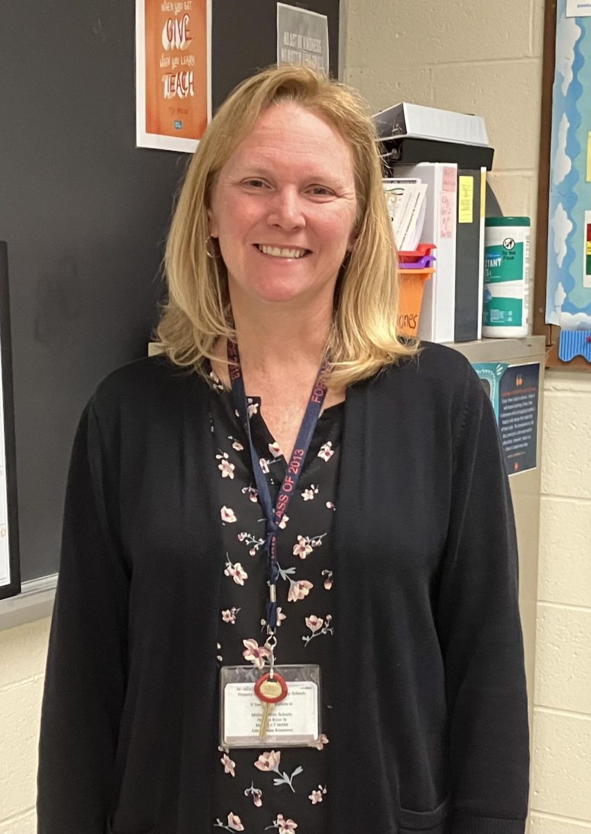 Leading Out Loud: Mrs. O’Keefe, leader of Foran’s Poetry Out Loud Club, November 18, 2024. Photo Courtesy: Ava McLaughlin (Photo One)