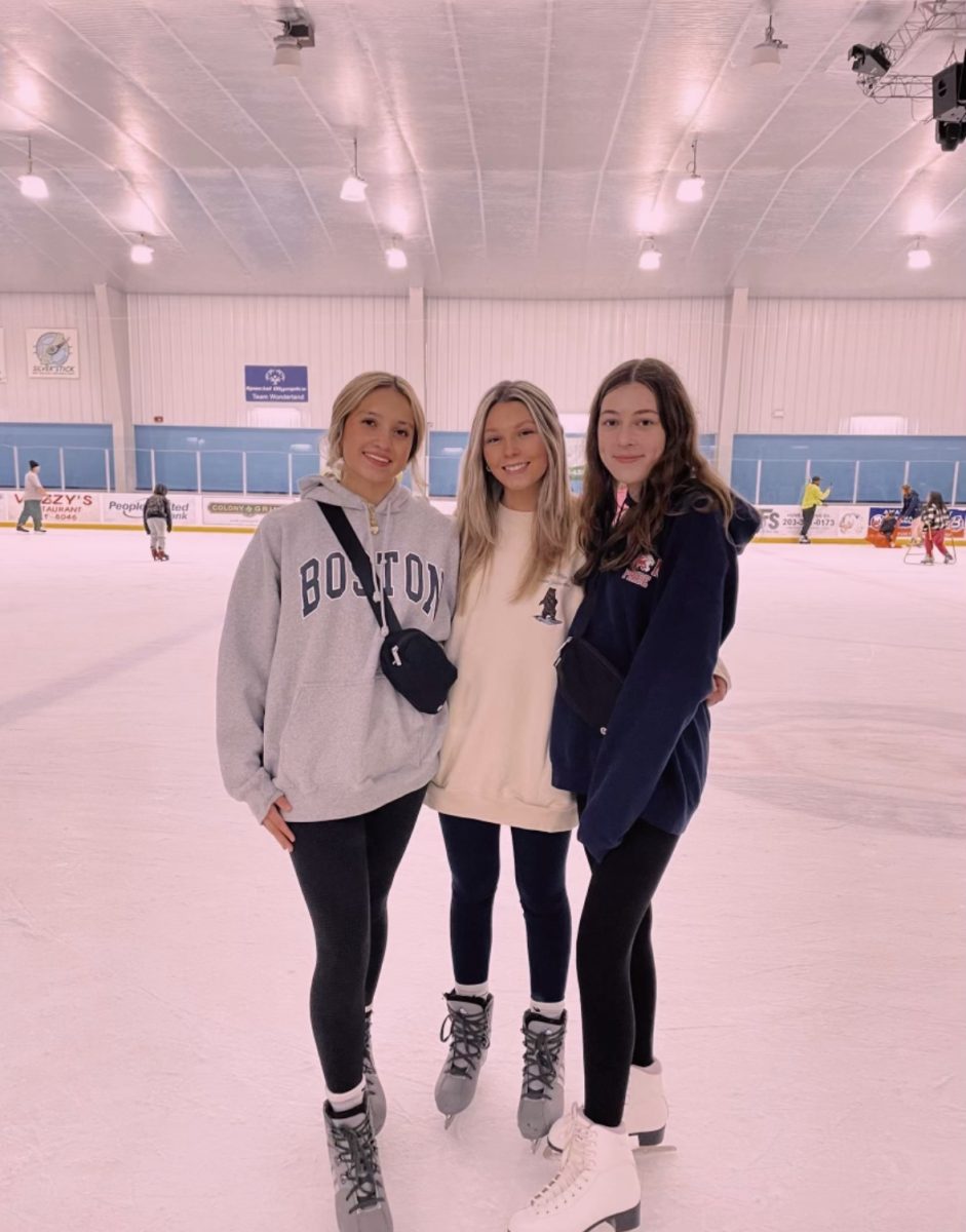 Having fun at the Ice Rink: Keelah Orellana (left), Carlie Simard (middle), Lila Rothbard (right), at the Milford Ice Rink, November 15, 2024.