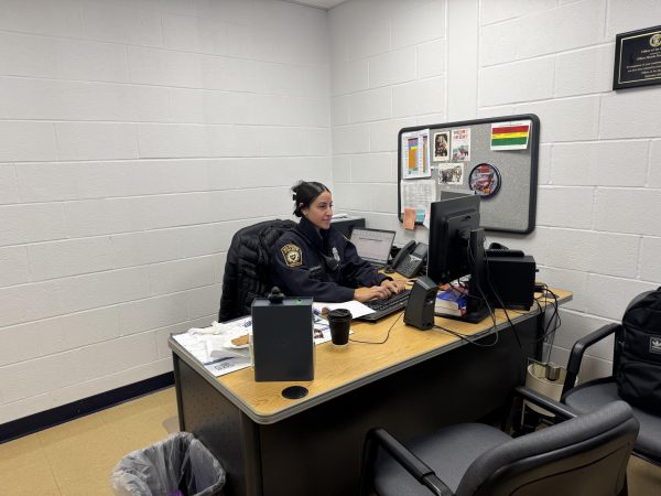 On the Job: Officer Kreitman working in her office, January 31, 2025. Photo courtesy: Ryan Lawrence