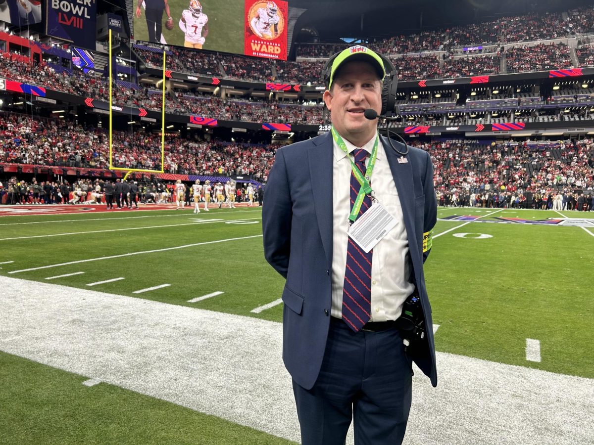 Green Hat: Eric Kerzner on the headset prior to Super Bowl LVIII. February 11, 2024. Photo courtesy: Unknown