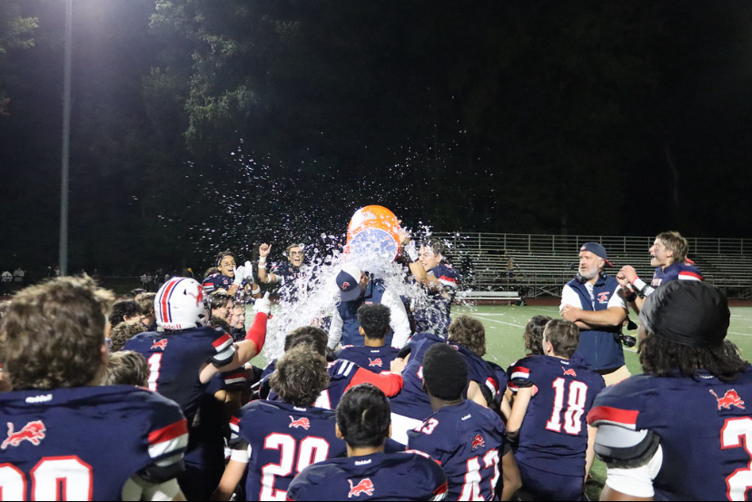 Victory Bath: G Walker Celebrates a dominating Foran win. Photo Courtesy: Lauren Bednarz