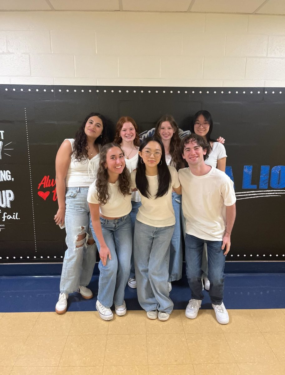 The Faces: Some of The Mane Street Mirror editors pose for a photo to be put in the senior magazine. April 17, 2025. Photo courtesy: Lisa Farrell.