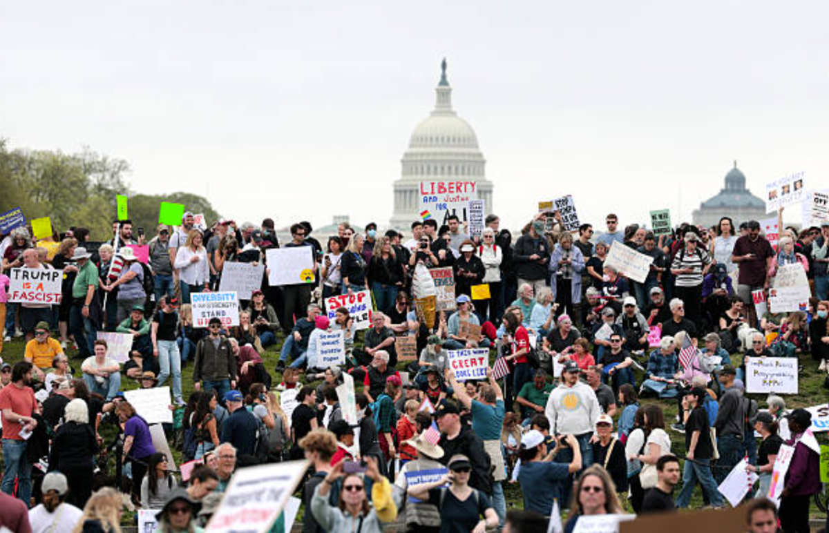 Cry of the People: A 2025 protest against Trump administration policies and Elon Musk's Department of Government Efficiency. Photo courtesy: Anna Moneymaker/Getty Images.