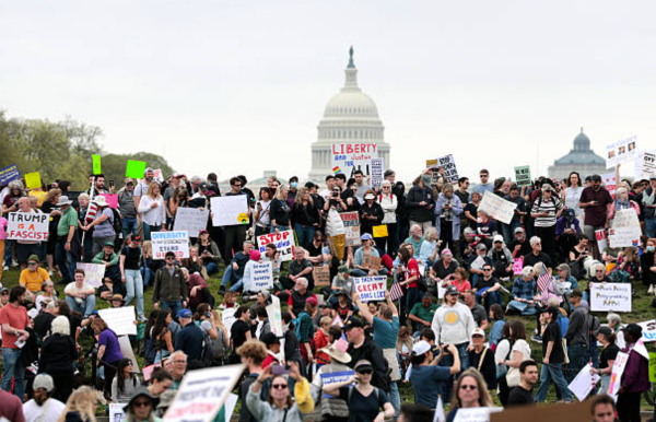 Cry of the People: A 2025 protest against Trump administration policies and Elon Musk's Department of Government Efficiency. Photo courtesy: Anna Moneymaker/Getty Images.