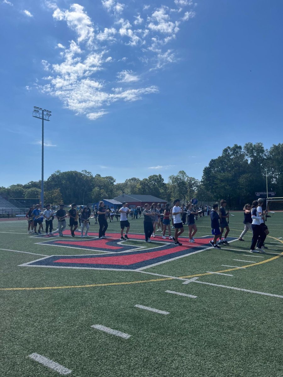Finishing the Formations: The marching band works together to perfect their formations before the first halftime performance. September 4, 2025. Photo courtesy: Laney Chan.