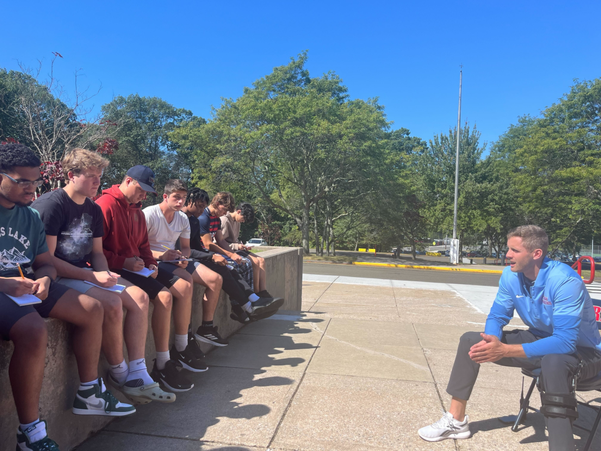 Interviewing Jeff Raucci: Journalism students interviewing Foran’s Athletic Director, Jeffery Raucci. September 5, 2025. Photo courtesy: Lisa Farrell