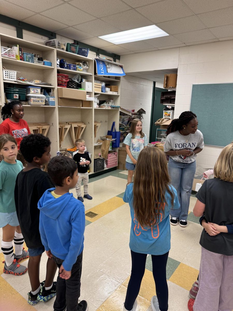 Members in Action: Key Club members volunteering at Mathewson Elementary School, assisting with childcare during a PTA meeting. September 9, 2025. Photo courtesy: Ryan Lawrence.