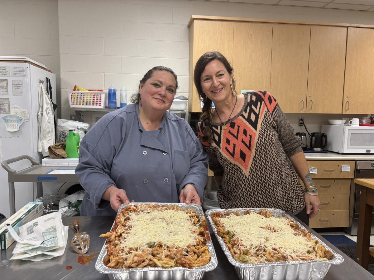 The Giving Table: Forans High School's Giving Table program is located in the culinary room. Ms. Randy and Ms. Pangu pose together in front of a meal made by the members. November 11, 2025. Photo courtesy: Tiffany Wilson