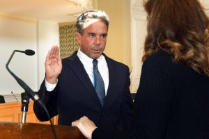Richard Smith is sworn in as the new Mayor of the City of Milford, in Milford, Conn. May 1, 2023. Smith was sworn into office by City Clerk Karen Fortunati.