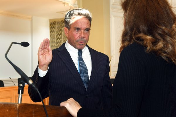 Richard Smith is sworn in as the new Mayor of the City of Milford, in Milford, Conn. May 1, 2023. Smith was sworn into office by City Clerk Karen Fortunati.