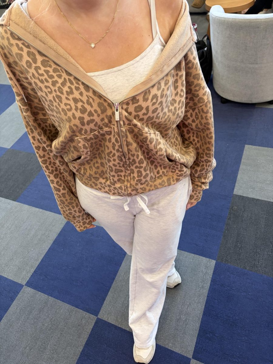 Outfit of the day: Sophomore Mia Mathewson wearing cheetah print and New Balances. Photo Credit: Eva Fernandes. November 14, 2025.