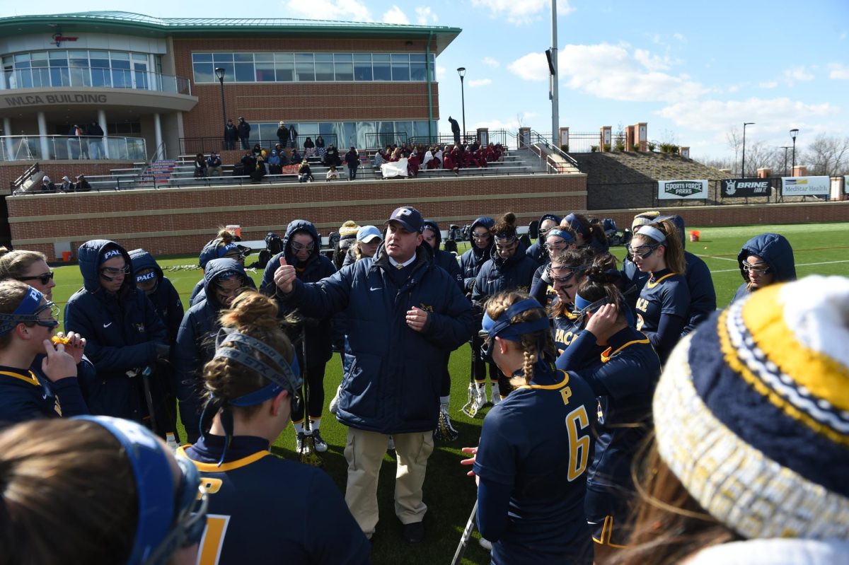Pace Pride: Coach Spinner prepares the Pace Lacrosse team before the game, April 29 2016, Photo courtesy: Pace University Athletics.