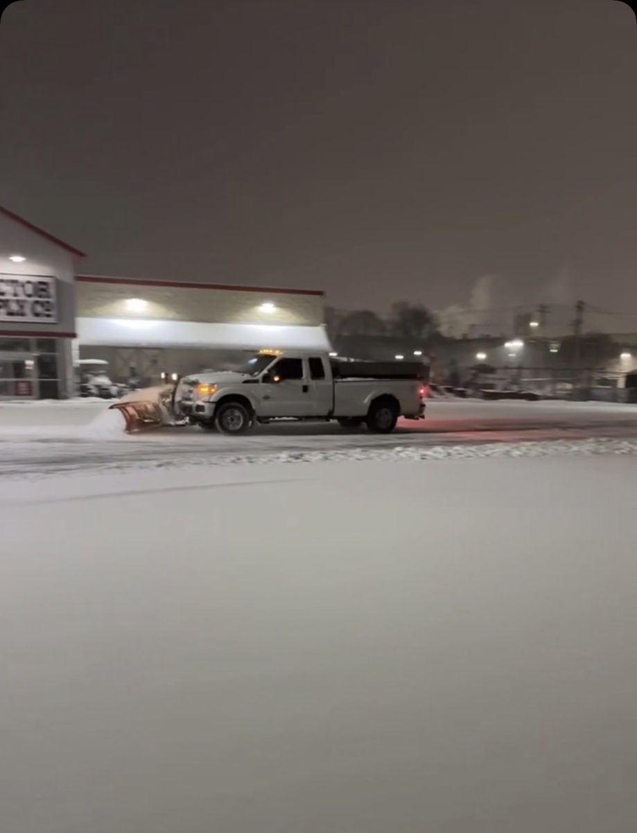 Plow at Work in a Commercial Lot: A plow clearing snow from the Tractor Supply lot, January 2, 2026. Photo courtesy: Daniel DeSousa.